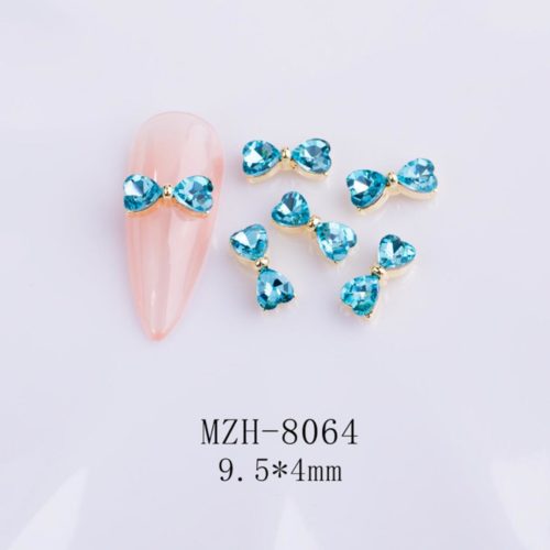 Fluga med Diamanter nagelsmycken i turkos högkvalitativt. Bow tie Diamonds blue nail jewelry för nail art, nageldekoration och andra konstprojekt Modell MZH-8064