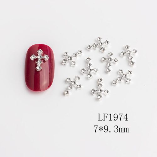 Kors med diamanter i vit nagelsmycken högkvalitativt. Cross with diamonds nail jewelry för nail art, nageldekoration och andra konstprojekt Modell LF1974