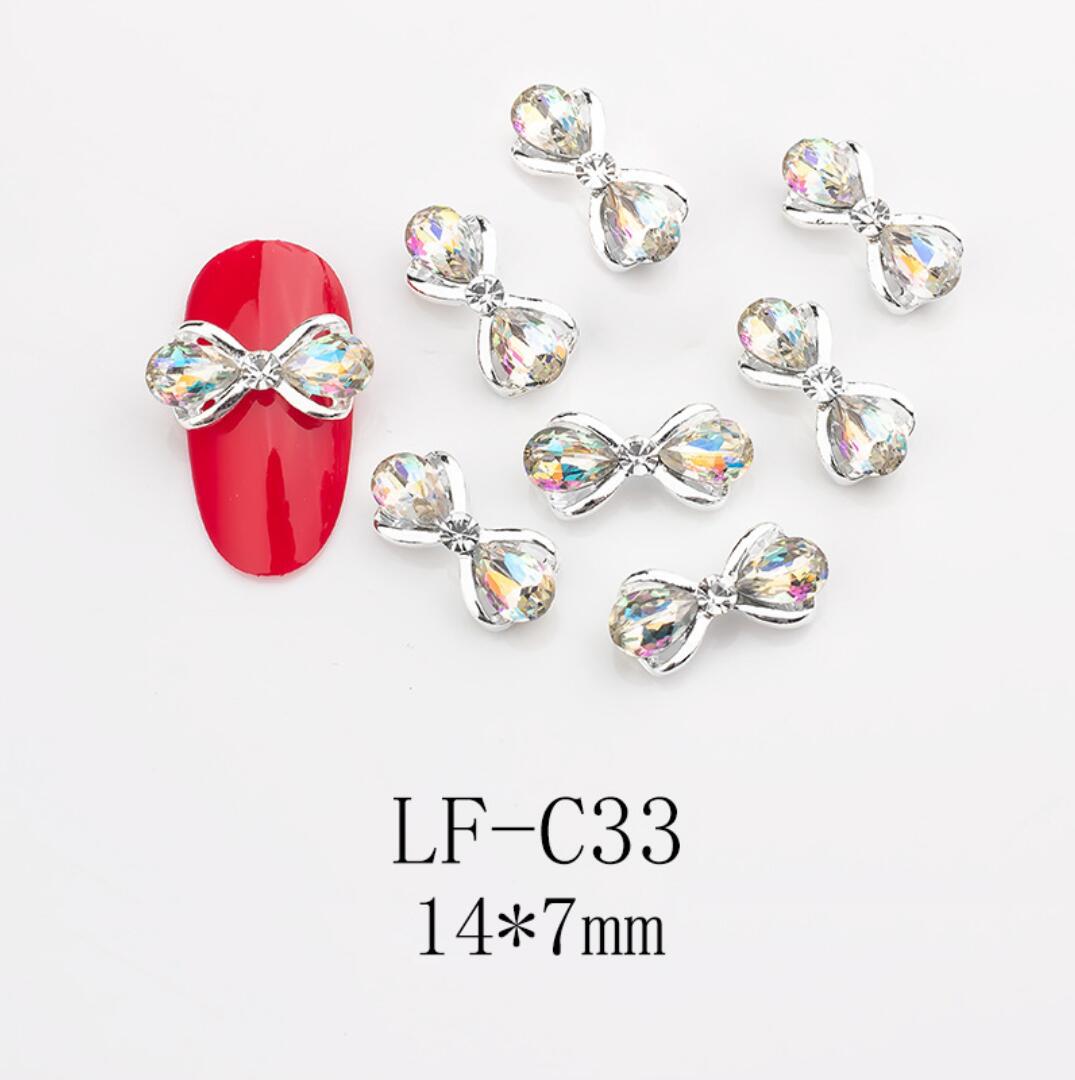 Nagelsmycken Fluga Diamanter vit Högkvalitativt Bow tie Diamonds nail jewelry 1st Nailart