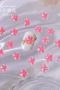 Japanska körsbärs blommor nagelmycken i rosa färg för nail art. Japanese cherry flowers i pink Nageldekoration SS102-2