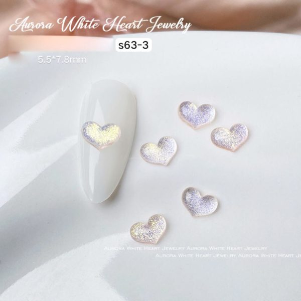 Vita glittrande hjärtan. Heart of angel nagelmycken för nageldekoration & för nail art S63-3