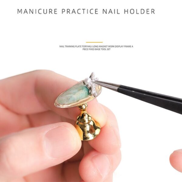 Nagelställ i guld Stativ för nagelövningar. Produkten används av nagelterapeut